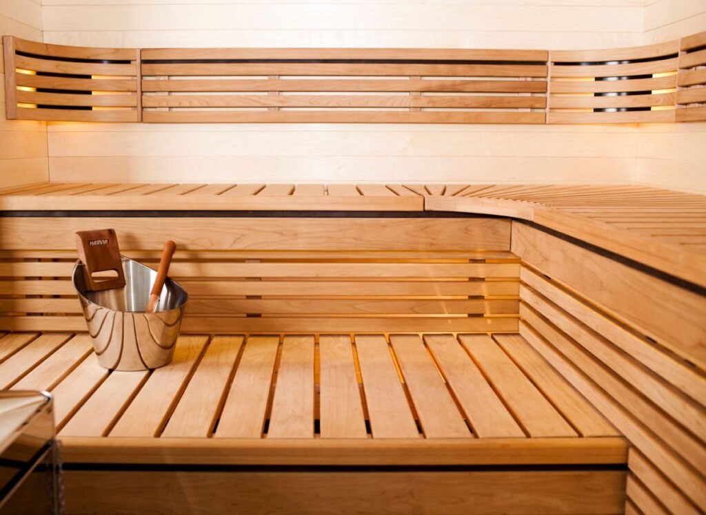 medium wood lined sauna interiors with glossy bucket and ladle