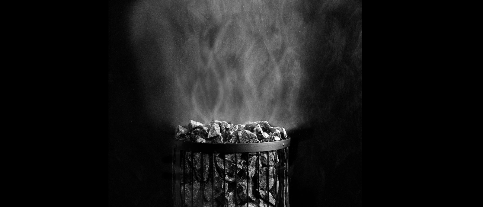 Water poured on hot stones in a Finnish sauna creating löyly steam